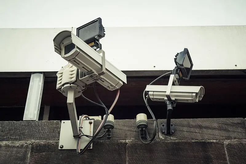 Surveillance cameras mounted on a building